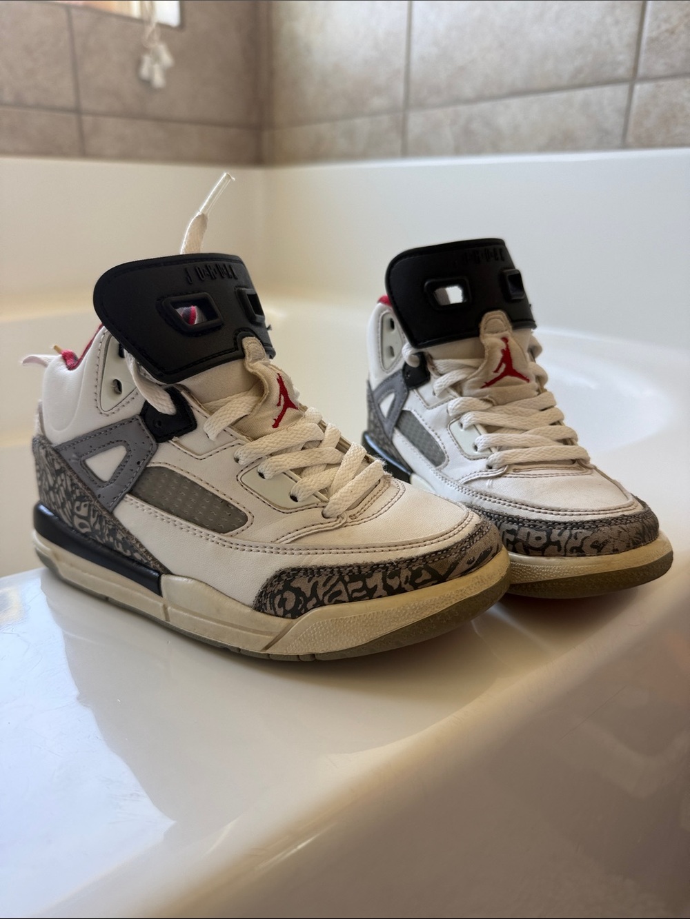 Jordan Kids White, Black & Gray Retro Basketball Sneakers with Red Logo